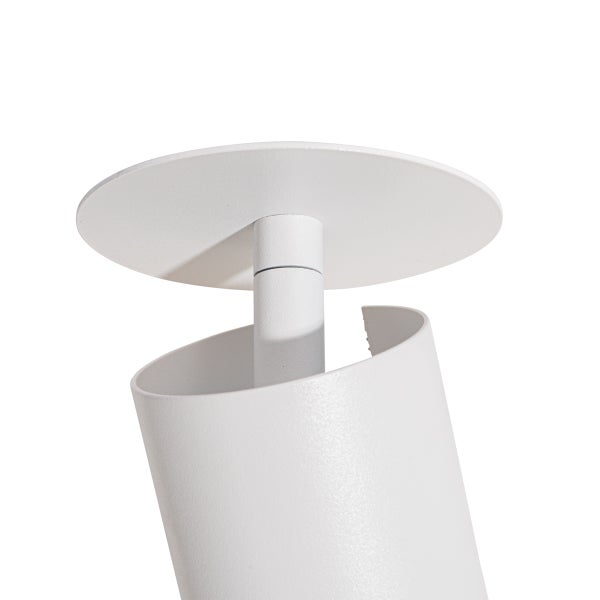 Nahaufnahme einer weißen zylindrischen Leuchte mit runder Abdeckplatte und strukturierter Oberfläche.