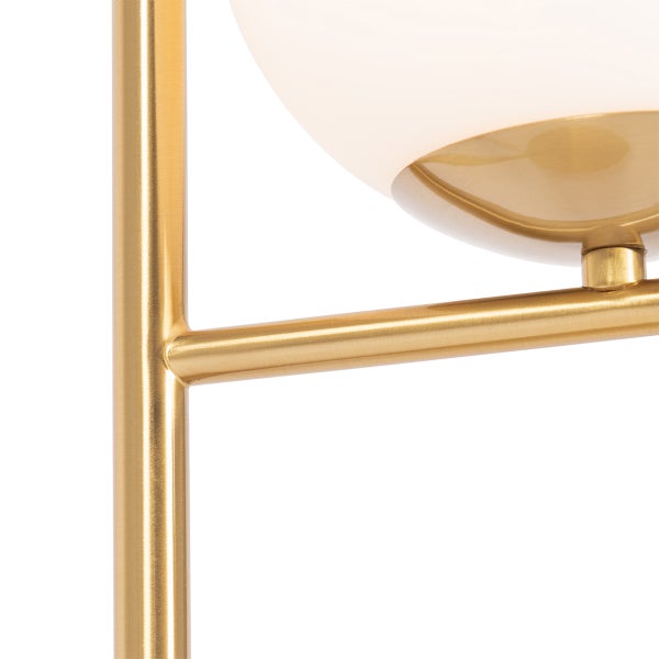 Detail einer goldenen Lampe mit runder Lichtkuppel