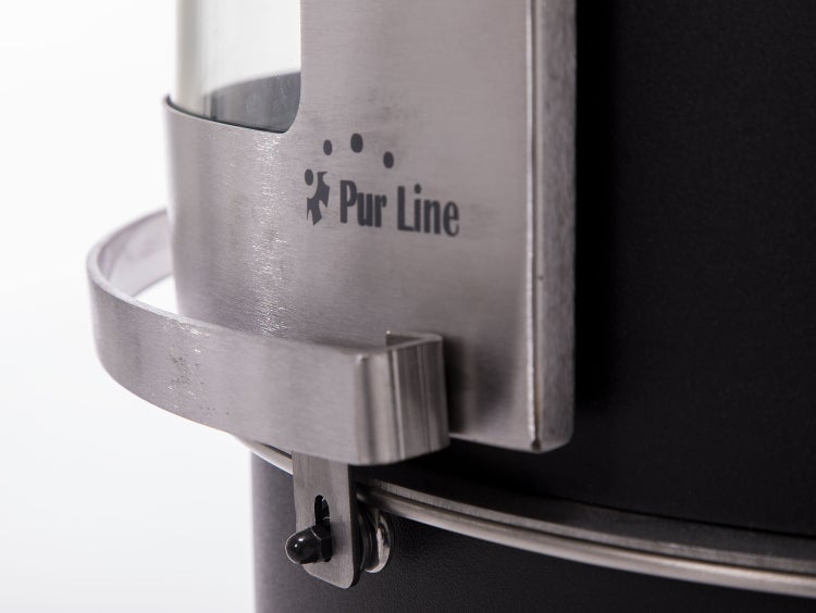 Detailansicht eines Ethanol-Kamins mit Pur Line Logo und Griff