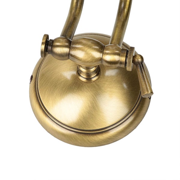 Detailansicht einer Wandleuchte mit Messing-Finish