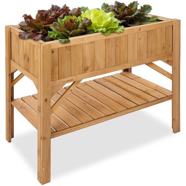 Hochbeet aus Holz mit Ablagefläche und Salatpflanzen