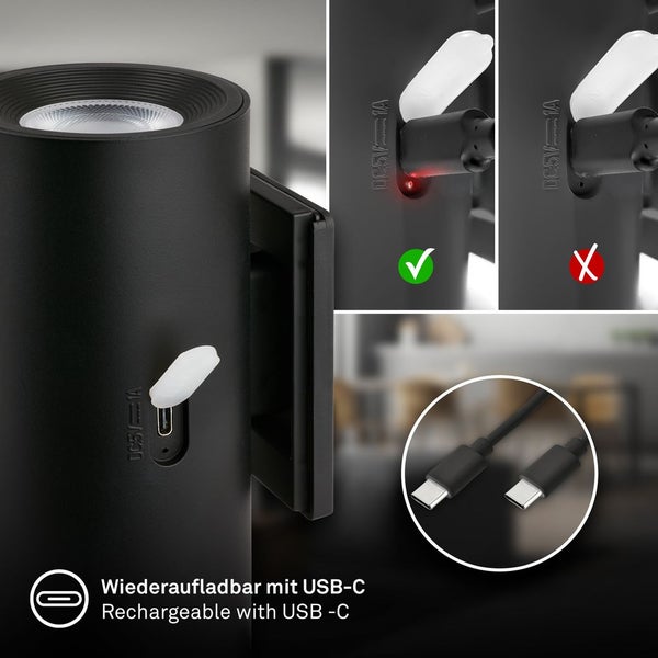 Wiederaufladbare schwarze Wandleuchte mit USB-C-Ladeanschluss, Statusanzeige für den Ladevorgang und USB-Kabel.