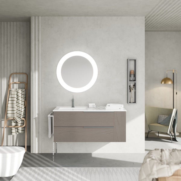 Modernes Badezimmer mit Waschtischunterschrank, beleuchtetem Rundspiegel und schlichtem Design in einer hellen und organisierten Umgebung.