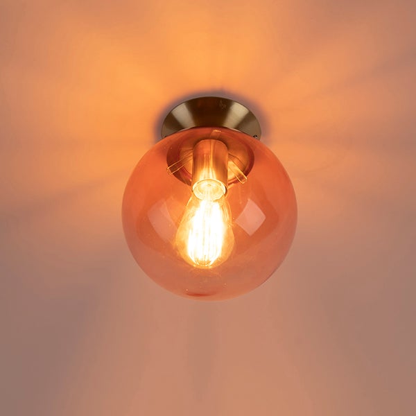 Deckenleuchte mit runder Glasabdeckung und Glühbirne