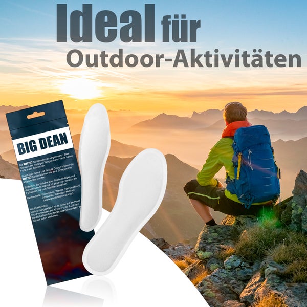Big Dean Sohlenwärmer für Outdoor-Aktivitäten, mit Verpackung und weißen Einlegesohlen vor einer Gebirgslandschaft bei Sonnenaufgang.