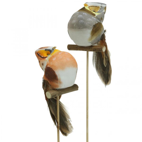 Dekorative Vögel auf Ständer zur Dekoration