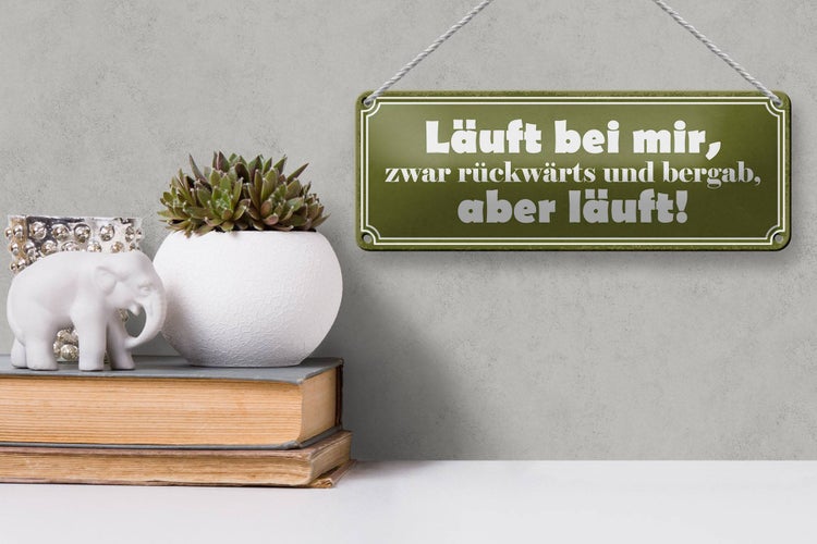 Blechschild Spruch 27x10cm läuft rückwärts und bergab aber Dekoration