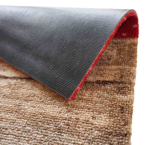 Detailansicht eines Teppichs mit Textur und rutschfester Unterseite