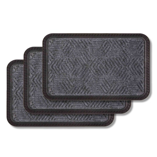 Drei Fußmatten mit geometrischem Muster und Bordüre