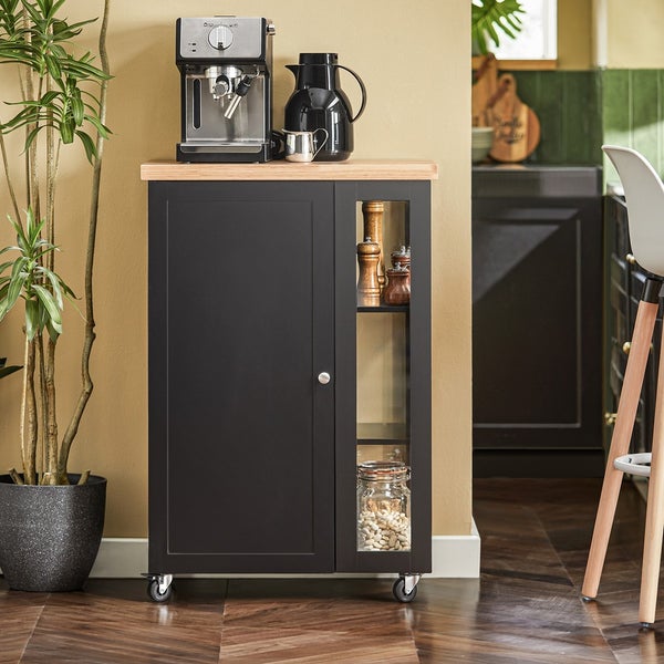 Küchenwagen mit Schublade, Tür und Regalen auf Rollen mit Espressomaschine und Dekoration