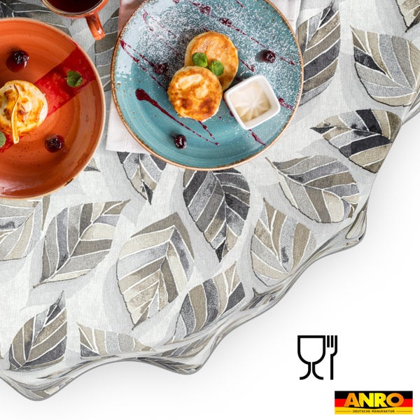 ANRO Tischdecke mit Blattmuster, lebensmittelecht, gedeckter Tisch mit Tellern und Speisen, ANRO Logo.