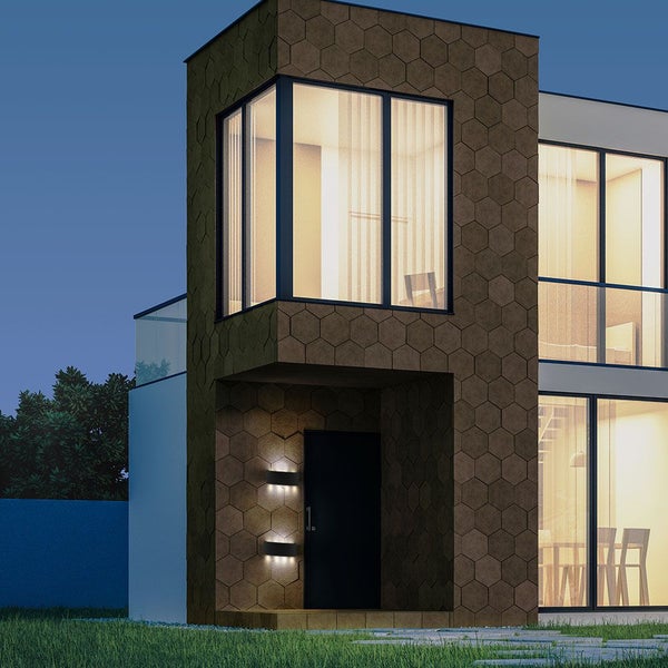 Modernes Haus mit Außenbeleuchtung am Eingangsbereich