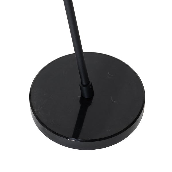 Runder schwarzer Marmorsockel einer Lampe mit einer schwarzen Metallstange.