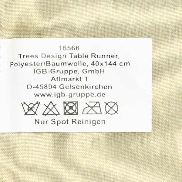 Etikett des Tischläufers Trees Design mit Pflegehinweisen und Materialangaben.