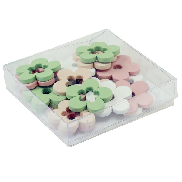 Dekorative Blumen aus Holz in einer transparenten Kunststoffbox