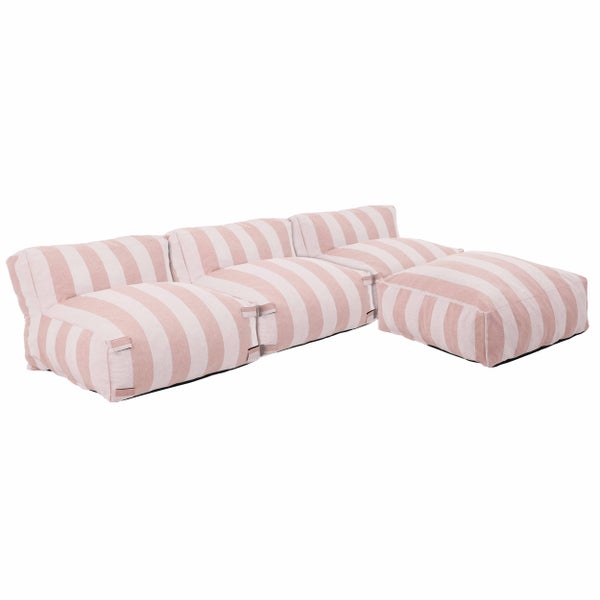 Modulares Sofa-Set mit rosa-weiß gestreiftem Stoffbezug, bestehend aus drei Sitzelementen und einem Hocker.