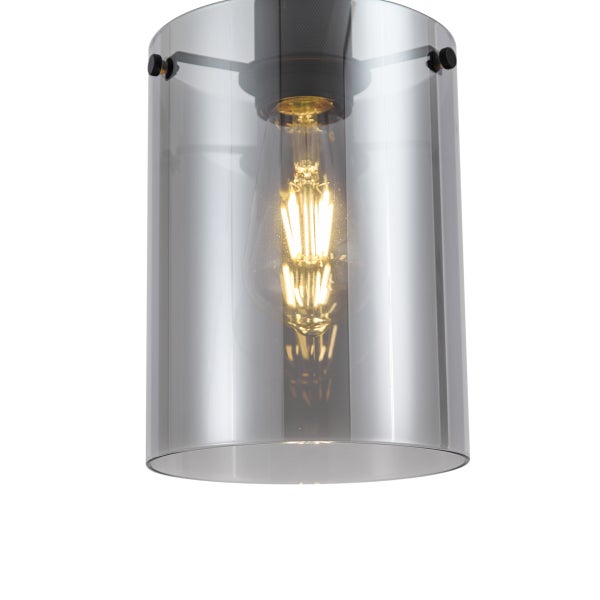 Zylindrische Hängeleuchte mit einem Schirm aus Rauchglas und einer leuchtenden Filamentlampe.