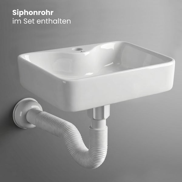 Rechteckiges weißes Wandwaschbecken aus Keramik inklusive flexiblem weißem Siphonrohr.