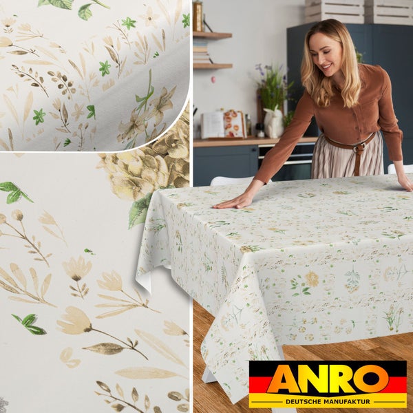 Abwaschbare Wachstuch-Tischdecke mit floralem Muster in einer hellen Küche. Detailansicht der Oberfläche und ANRO Logo.