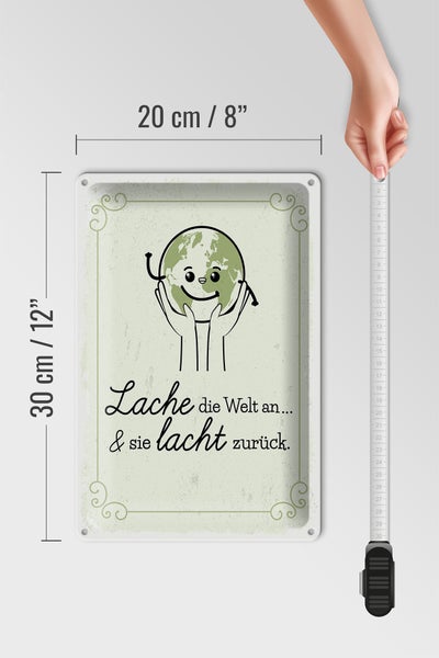 Blechschild Spruch Lache die Welt an sie lacht zurück 20x30cm