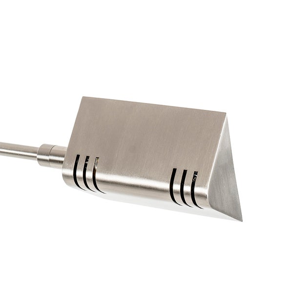 Metallische Leselampe mit Schlitzen zur Belüftung.