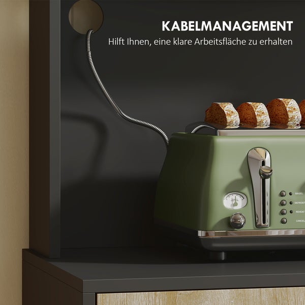 Grüner Toaster auf einer schwarzen Ablage mit Kabelmanagement durch eine Öffnung in der Rückwand für eine ordentliche Arbeitsfläche.