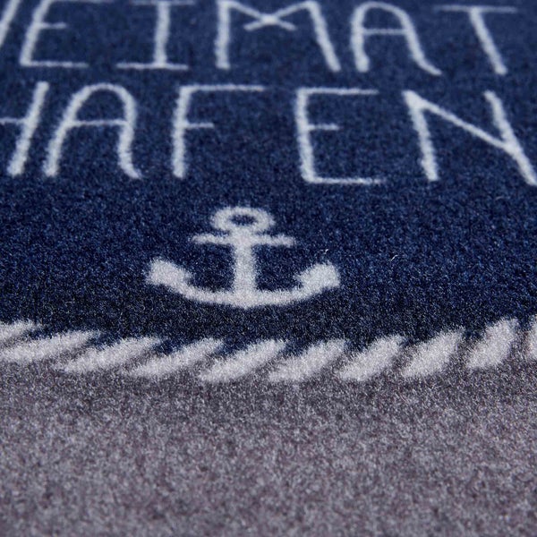 Fußmatte mit dem Schriftzug Heimathafen und einem Anker