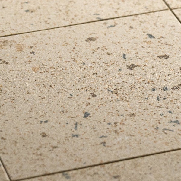 Steinzeugfliese mit gesprenkelter Oberflaeche und strukturierter Optik für Bodenbeläge