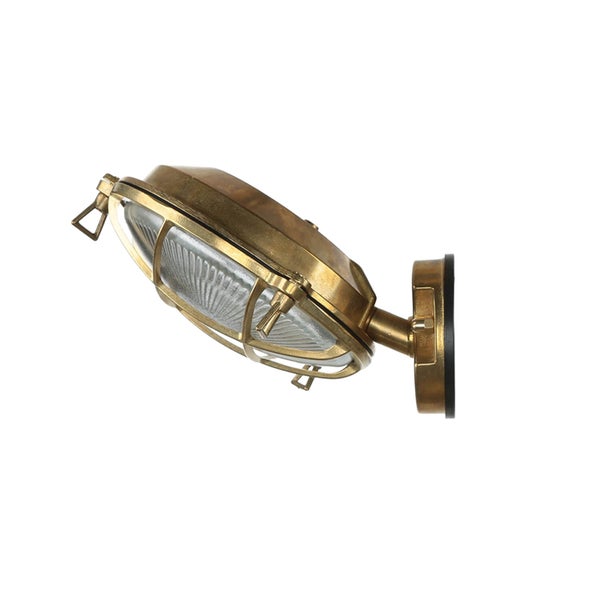 Messingfarbene Wandleuchte mit Schutzgitter