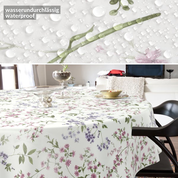 Runde wasserfeste Tischdecke mit Blumenmuster in einem hellen Wohnzimmer. Detailansicht der wasserabweisenden Oberfläche.