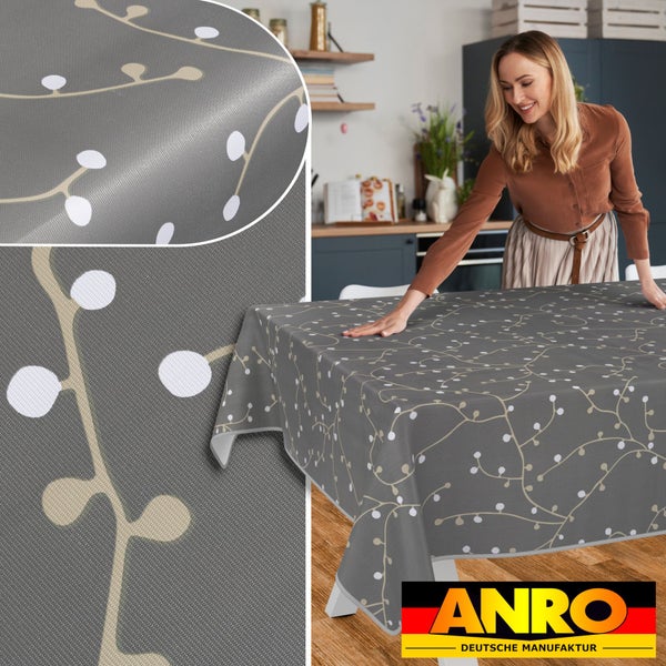 Graue Tischdecke mit Blumenmuster auf einem Tisch, ANRO Logo