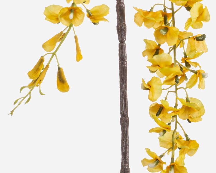 Künstliche Ranke mit gelben trichterförmigen Blüten und grünen herzförmigen Blättern.