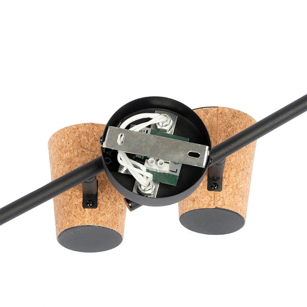 Detailaufnahme einer Deckenleuchte mit Korkelementen und Anschlussklemmen