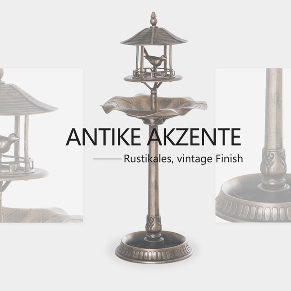Antike Vogeltränke aus Metall mit Vogelhaus und blattförmiger Schale, rustikales Vintage-Finish.