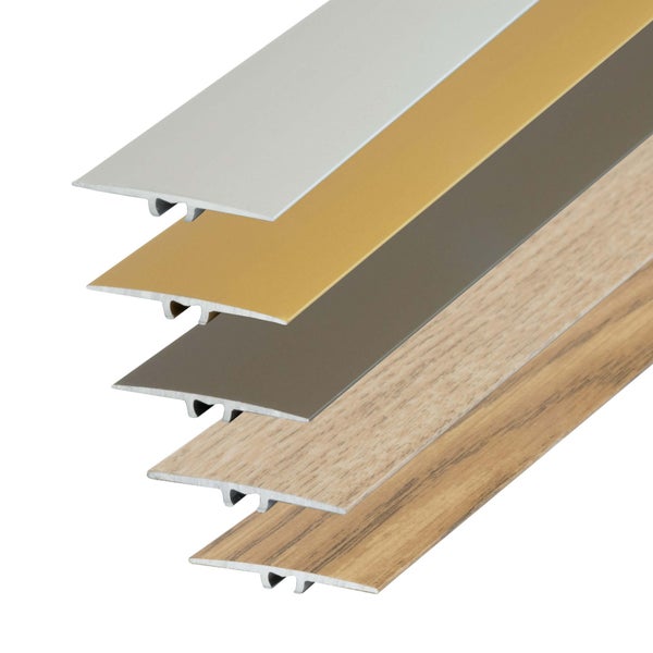 Übergangsprofile in T-Form für Bodenbeläge in verschiedenen Metall- und Holzdekoren.