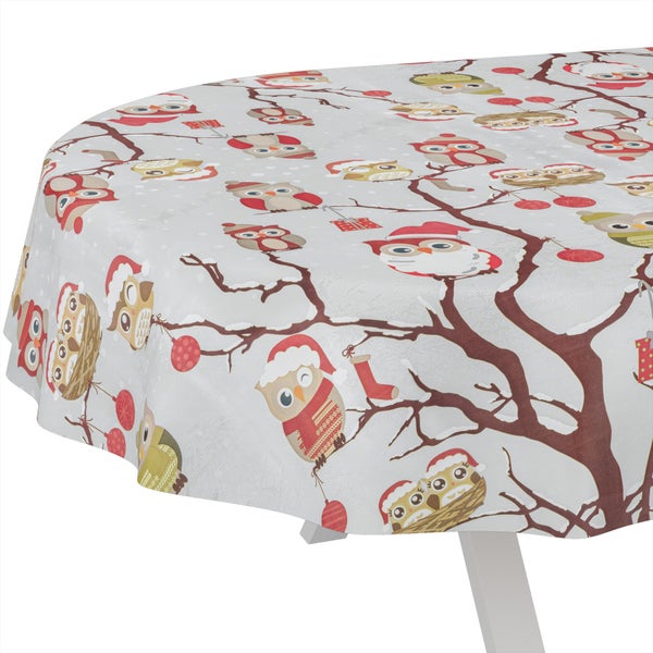 Runde Tischdecke mit winterlichem Eulenmotiv, Zweigen und Schneeflocken.