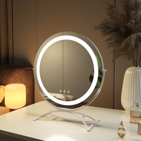 Runder Kosmetikspiegel mit LED-Beleuchtung auf einem Schminktisch