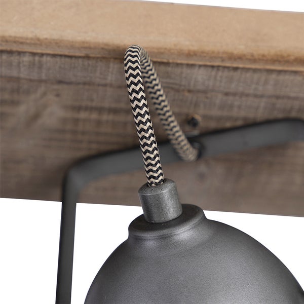 Detailaufnahme einer Pendelleuchte mit Textilkabel und Lampenschirm