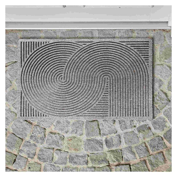 Fußmatte mit Muster aus konzentrischen Kreisen und geraden Linien