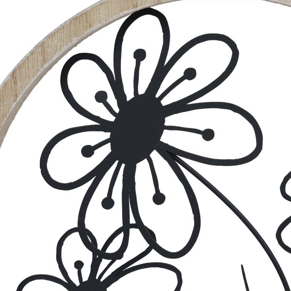 Dekoration mit floralem Muster in einem Holzrahmen