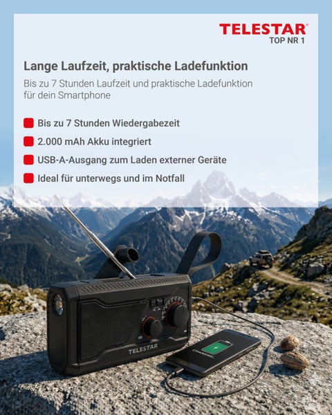Telestar Notfallradio mit integriertem 2000 mAh Akku und USB Ladefunktion für Smartphones vor einer Bergkulisse.