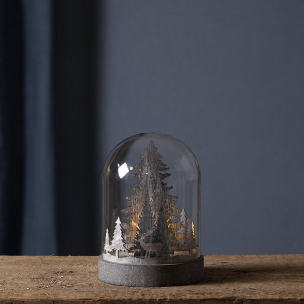 Dekorative Glaskuppel mit Waldmotiv und Beleuchtung