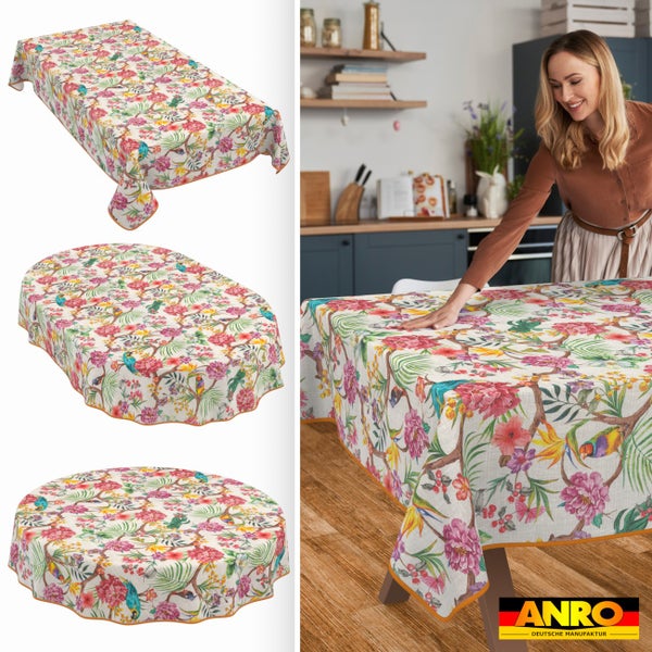 Tischdecke mit tropischem Muster aus Vögeln und Blumen in rechteckiger, ovaler und runder Form in einer Küche sowie ANRO Logo.