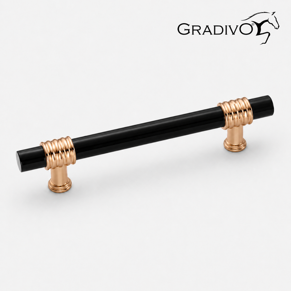 Gradivo Logo. Möbelgriff mit schwarzem Zylinderstab und kupferfarbenen geriffelten Halterungen.