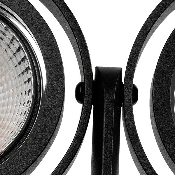 Detailaufnahme einer schwarzen Außenleuchte mit runden Elementen