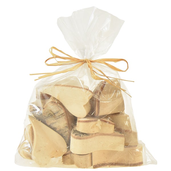 Dekorative Holzelemente in einer transparenten Verpackung mit Schleife