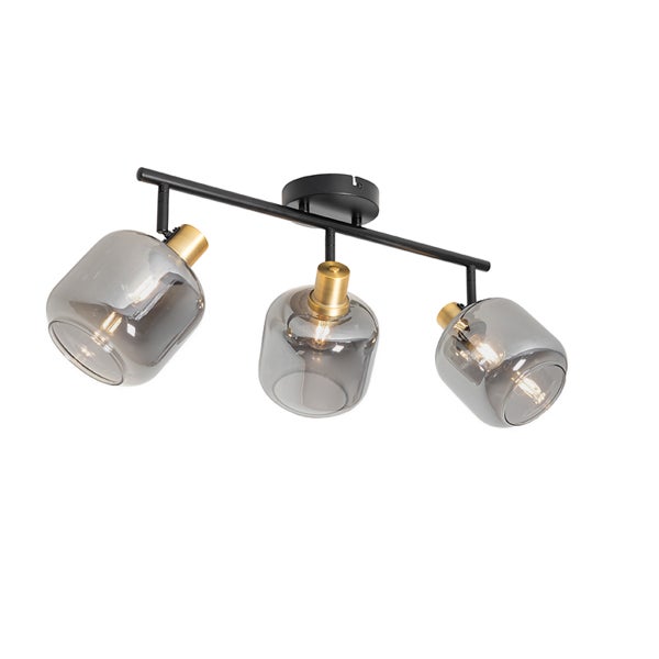 Dreiflammige Deckenleuchte mit schwarzer Metallstange, messingfarbenen Fassungen und rauchgrauen Glasschirmen.