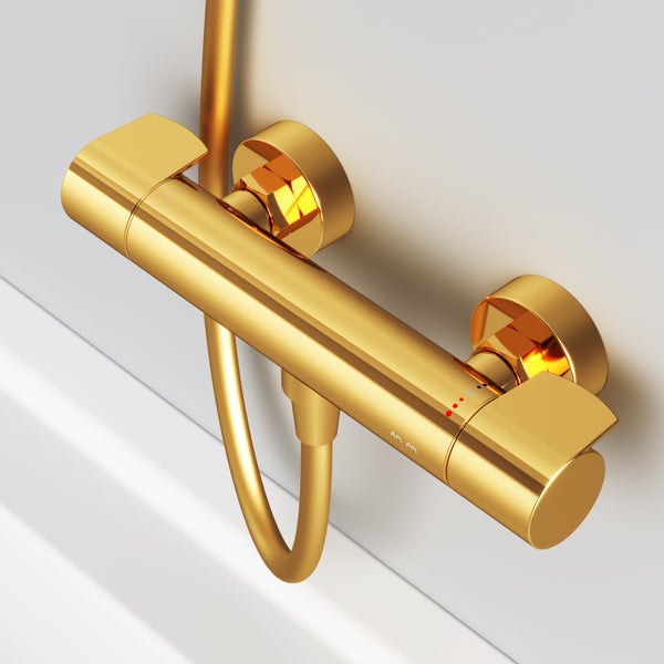 Aufputz-Brausethermostat in Gold mit Temperaturregler und Markierung für 38 Grad, AM.PM Logo.