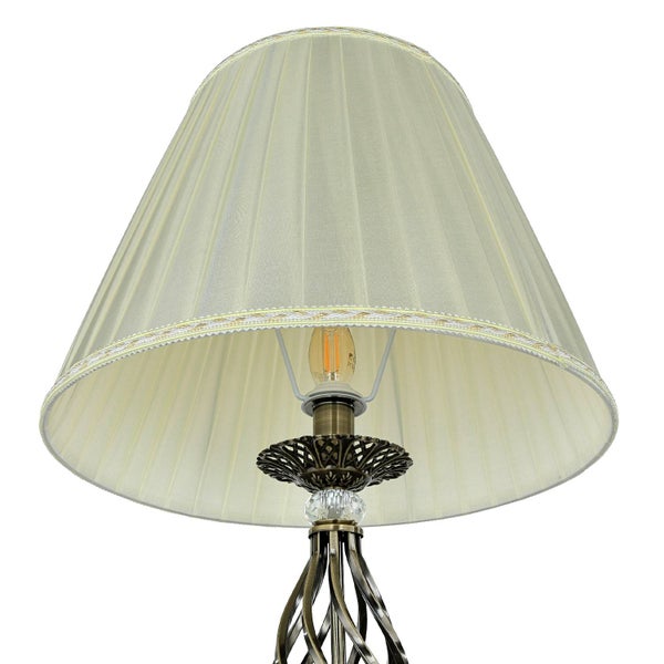 Stehlampe mit Lampenschirm und dekorativem Gestell