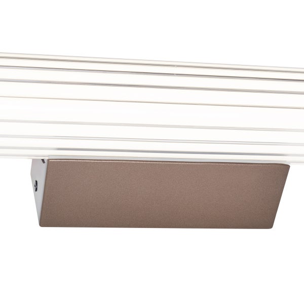 Detailaufnahme eines Schienensystems mit einem daran befestigten Spot.